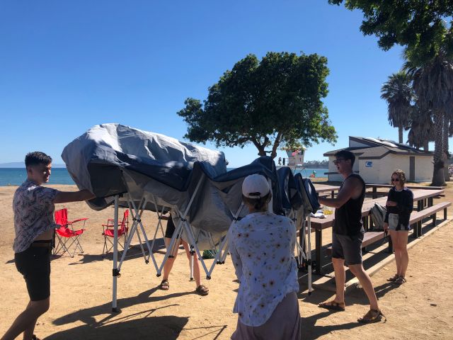 Setting up canopy tent